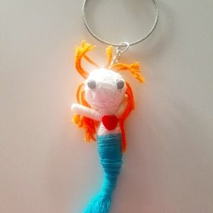 4 inch tall Mermaid string doll key chain.